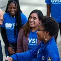 A group of Thompson Scholars meeting Robert Thompson.